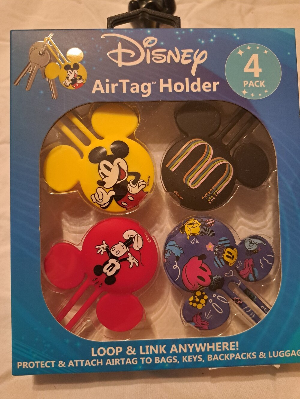 Disney Mickey Mouse AirTag Holder 4-Pack - Yellow, Black, Red, Blue Pattern